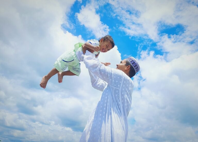 a man and a woman jumping in the air
